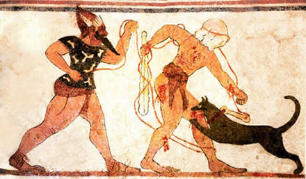 Tomba degli Àuguri a Tarquinia (V secolo a.C.), un personaggio denominato Phersu è rappresentato con una maschera sul volto. Compare assieme ad un guerriero dalla in un panno che brandisce una nodosa clava con la quale si difende da un molosso che lo azzanna e che è tenuto al guinzaglio dallo stesso Phersu.