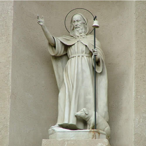 Statua di Sant'Antonio a Tricarico, col bastone con campanello e porcellino ai piedi